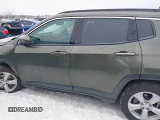 2018 Jeep Compass Altitude with VIN 3C4NJDBB1JT479462, listed as a IAAI auction lot 41276119 with 58,895 mi miles and . Bid and sale history available at carsss.com. Image 14.