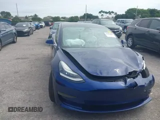 2020 Tesla Model 3 Standard Range Plus with VIN 5YJ3E1EA7LF785838, listed as a IAAI auction lot 41586081 with 38,392 mi miles and . Bid and sale history available at carsss.com. Image 12.