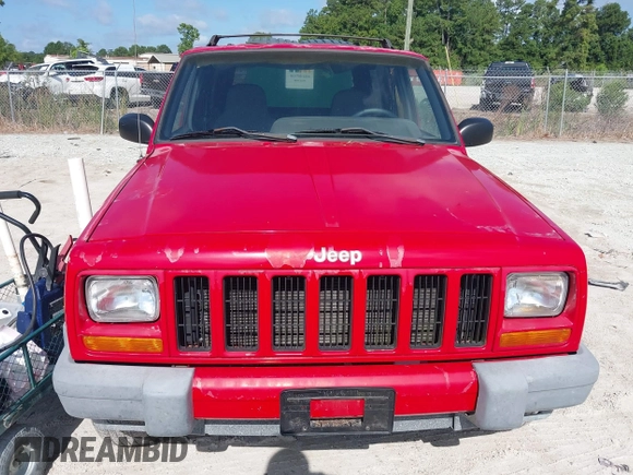 2001 Jeep Cherokee Sport z VIN 1J4FT48S01L508039, wystawiony jako IAAI lot #42743009 z przebiegiem 200 074 mil mil oraz . Historia ofert i sprzedaży dostępna na DreamBid. Obrazek 6.