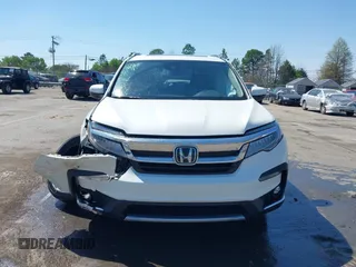 2019 Honda Pilot Touring 8-Passenger z VIN 5FNYF5H93KB021978, wystawiony jako IAAI lot #41915333 z przebiegiem 82 676 mil mil oraz . Historia ofert i sprzedaży dostępna na DreamBid. Obrazek 12.