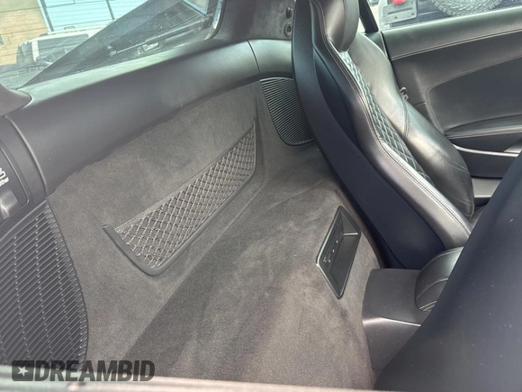 2021 Audi R8 z VIN WUAKBAFX7M7900472, wystawiony jako Copart lot #58422395 z przebiegiem 6493 mil mil oraz Szkody całkowita. Historia ofert i sprzedaży dostępna na DreamBid. Obrazek 6.