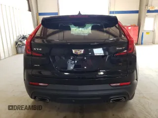 2020 Cadillac XT4 AWD Luxury with VIN 1GYFZBR42LF081550, listed as a Copart auction lot 68891524 with 27,985 mi miles and Salvage Title. Bid and sale history available at carsss.com. Image 6.