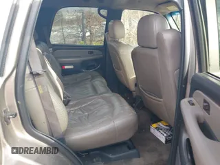 2002 Chevrolet Tahoe LS z VIN 1GNEC13Z22R197594, wystawiony jako IAAI lot #41475477 z przebiegiem 384 968 mil mil oraz . Historia ofert i sprzedaży dostępna na DreamBid. Obrazek 8.