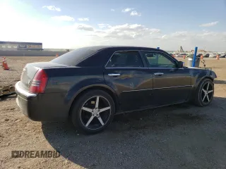2006 Chrysler 300 C with VIN 2C3KA63H06H272552, listed as a Copart auction lot 72185684 with 105,737 mi miles and Salvage Title. Bid and sale history available at carsss.com. Image 3.