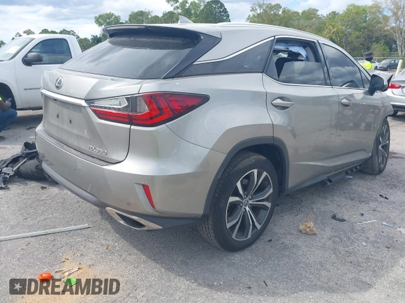 2019 Lexus RX with VIN 2T2ZZMCA1KC131631, listed as a IAAI auction lot 41692742 with 90,161 mi miles. Bid and sale history available at carsss.com. Image 4.