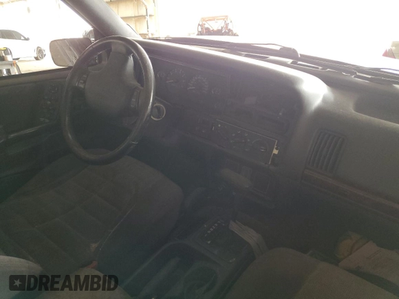 1996 Jeep Grand Cherokee Laredo with VIN 1J4GZ58S6TC304597, listed as a Copart auction lot 52962545 with Not provided miles and Salvage title. Bid and sale history available at DreamBid. Image 8.