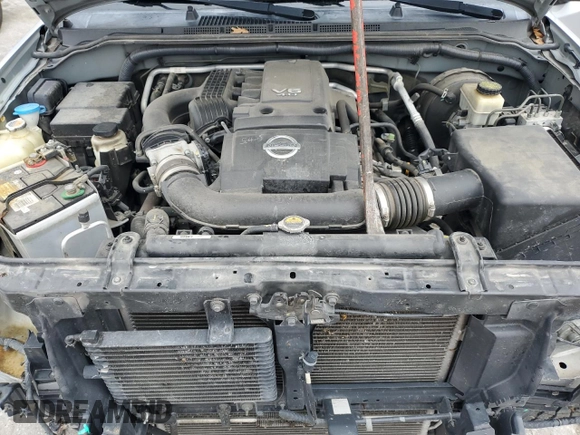 2014 Nissan Frontier SL z VIN 1N6AD0FV2EN720242, wystawiony jako Copart lot #86976214 z przebiegiem 118 581 mil mil oraz Szkoda całkowita • Salvage title. Historia ofert i sprzedaży dostępna na DreamBid. Obrazek 11.