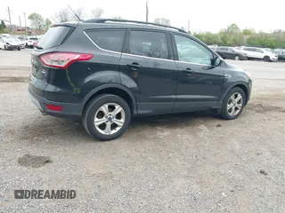 2015 Ford Escape SE with VIN 1FMCU9GX8FUA13813, listed as a IAAI auction lot 42075105 with 109,737 mi miles. Bid and sale history available at carsss.com. Image 4.