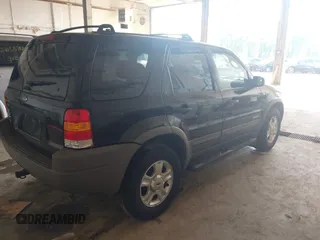 2002 Ford Escape XLT Choice with VIN 1FMYU04142KB44597, listed as a IAAI auction lot 42426580 with 149,022 mi miles and . Bid and sale history available at DreamBid. Image 4.