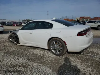 2022 Dodge Charger SXT with VIN 2C3CDXJG6NH245074, listed as a Copart auction lot 79961294 with 27,844 mi miles and Salvage Title. Bid and sale history available at carsss.com. Image 2.