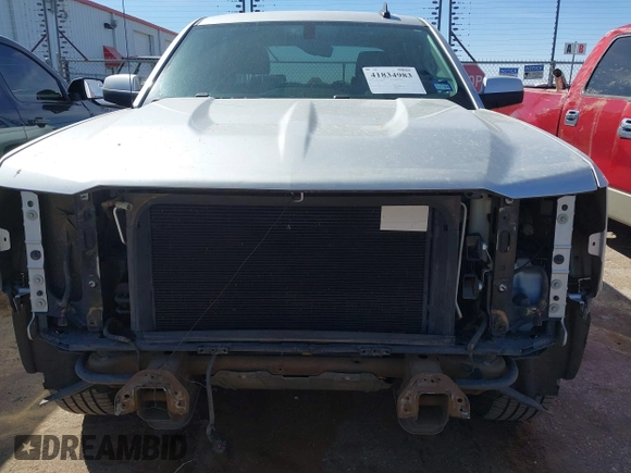 2018 Chevrolet Silverado 1500 LT with VIN 3GCPCREC5JG506529, listed as a IAAI auction lot 41834983 with 83,623 mi miles and . Bid and sale history available at DreamBid. Image 13.