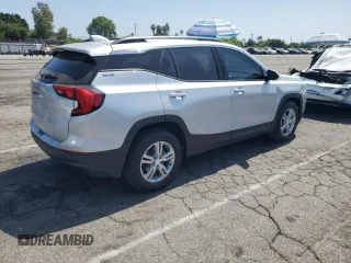 2019 GMC Terrain SLE with VIN 3GKALMEV4KL250147, listed as a Copart auction lot 61103705 with 33,499 mi miles and Salvage title. Bid and sale history available at DreamBid. Image 3.