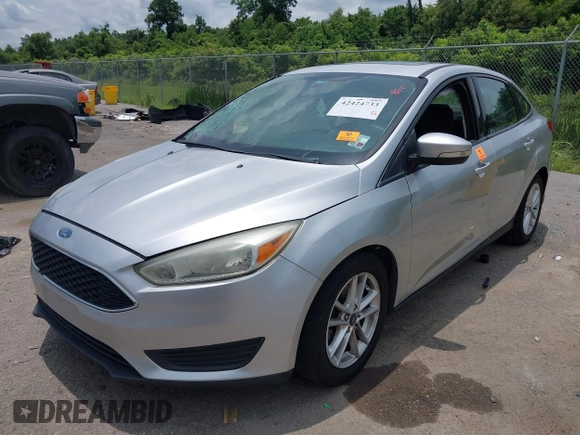 2016 Ford Focus SE with VIN 1FADP3F26GL351775, listed as a IAAI auction lot 42424733 with 164,886 mi miles and . Bid and sale history available at DreamBid. Image 2.