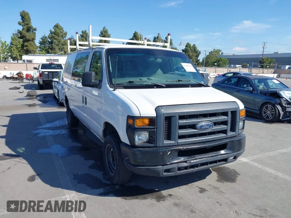 2013 Ford Econoline Cargo Commercial with VIN 1FTNE1EW7DDA98789, listed as a IAAI auction lot 42382594 with 251,602 mi miles and . Bid and sale history available at DreamBid. Image 6.