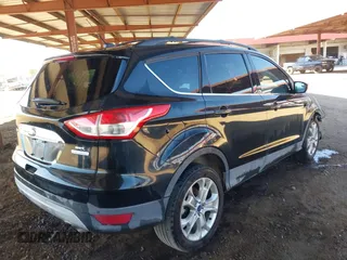 2013 Ford Escape SEL with VIN 1FMCU0H98DUD70174, listed as a IAAI auction lot 41675596 with 1 mi miles. Bid and sale history available at carsss.com. Image 4.