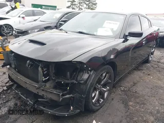 2018 Dodge Charger SXT Plus with VIN 2C3CDXHG0JH289216, listed as a IAAI auction lot 42085449 with 90,902 mi miles and . Bid and sale history available at DreamBid. Image 2.