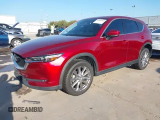 2020 Mazda CX-5 Grand Touring with VIN JM3KFADM7L0729537, listed as a IAAI auction lot 41864569 with 82,998 mi miles. Bid and sale history available at carsss.com. Image 19.