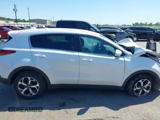 2021 Kia Sportage LX with VIN KNDPM3AC8M7932425, listed as a IAAI auction lot 39067549 with 56,841 mi miles. Bid and sale history available at carsss.com. Image 12.