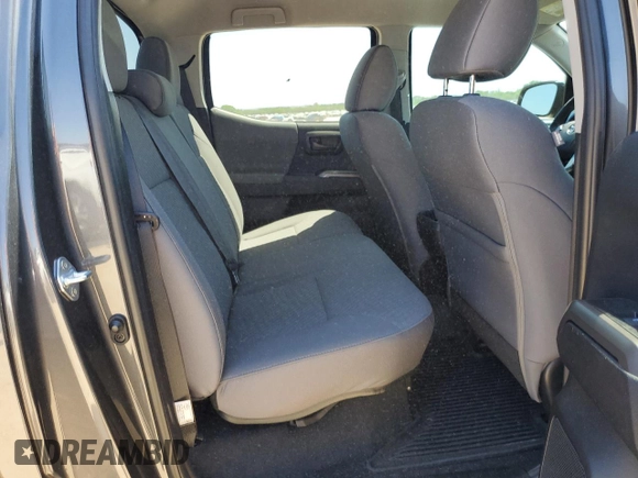 2023 Toyota Tacoma SR5 z VIN 3TYAZ5CN1PT035205, wystawiony jako Copart lot #52236045 z przebiegiem 10 752 mil mil oraz Czysty tytuł • Clean title. Historia ofert i sprzedaży dostępna na DreamBid. Obrazek 10.