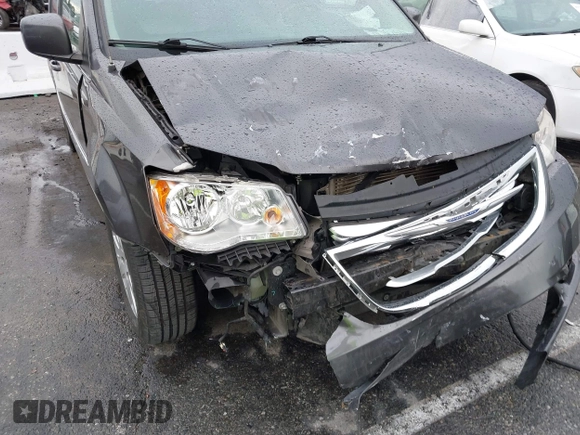 2015 Chrysler Town & Country Touring with VIN 2C4RC1BG9FR720782, listed as a IAAI auction lot 41765488 with 129,889 mi miles and . Bid and sale history available at DreamBid. Image 6.