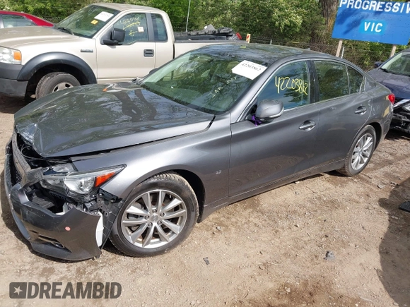 2015 Infiniti Q50 Premium z VIN JN1BV7AR1FM398047, wystawiony jako IAAI lot #42203862 z przebiegiem 104 002 mil mil oraz . Historia ofert i sprzedaży dostępna na DreamBid. Obrazek 17.