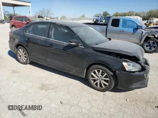 2013 Volkswagen Jetta SE with VIN 3VWDX7AJ0DM269550, listed as a Copart auction lot 74886184 with 130,181 mi miles and Salvage title. Bid and sale history available at DreamBid. Image 4.