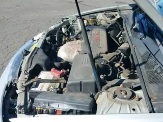 2002 Toyota Camry LE z VIN 4T1BE32K12U051024, wystawiony jako IAAI lot #43323194 z przebiegiem 173 974 mil mil oraz . Historia ofert i sprzedaży dostępna na DreamBid. Obrazek 21.