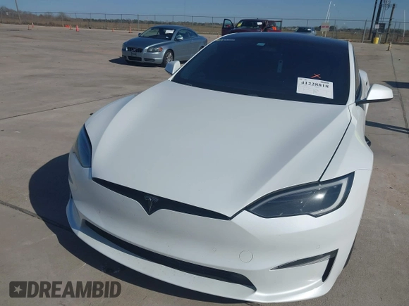 2022 Tesla Model S Plaid with VIN 5YJSA1E69NF486471, listed as a IAAI auction lot 41228818 with 49,207 mi miles and . Bid and sale history available at carsss.com. Image 6.