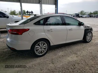 2018 Ford Focus Titanium с VIN 1FADP3J23JL246545, выставлен на аукционе Copart как лот 54838735 с пробегом 85 507 миль миль и Списание • Salvage title. История ставок и продаж доступна на DreamBid. Изображение 3.