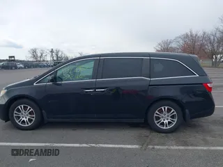 2012 Honda Odyssey EX with VIN 5FNRL5H47CB105451, listed as a IAAI auction lot 41872967 with 295,947 mi miles and . Bid and sale history available at carsss.com. Image 14.