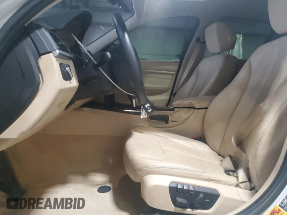 2013 BMW 3 Series 328i xDrive with VIN WBA3B3C54DF536837, listed as a Copart auction lot 62305215 with 289,839 mi miles and Salvage title. Bid and sale history available at DreamBid. Image 7.