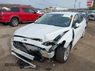 2020 Ford Fusion Hybrid SE with VIN 3FA6P0LU5LR195611, listed as a IAAI auction lot 41807998 with 128,439 mi miles. Bid and sale history available at carsss.com. Image 17.