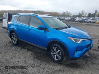 2018 Toyota RAV4 XLE with VIN 2T3RFREV0JW722354, listed as a IAAI auction lot 41974466 with 65,013 mi miles. Bid and sale history available at carsss.com. Image 1.