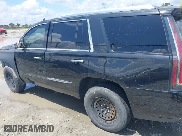 2019 Cadillac Escalade Platinum with VIN 1GYS4DKJ9KR138333, listed as a IAAI auction lot 42523430 with 104,787 mi miles and . Bid and sale history available at DreamBid. Image 14.
