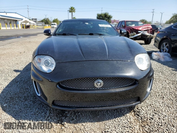 2010 Jaguar XK with VIN SAJWA4GB5ALB36022, listed as a Copart auction lot 56038565 with 101,988 mi miles and Clean Title. Bid and sale history available at DreamBid. Image 5.