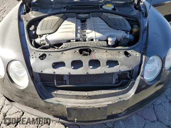 2007 Bentley Continental GT z VIN SCBDR33W17C050619, wystawiony jako Copart lot #84768364 z przebiegiem 248 389 mil mil oraz Szkoda całkowita • Salvage title. Historia ofert i sprzedaży dostępna na DreamBid. Obrazek 11.
