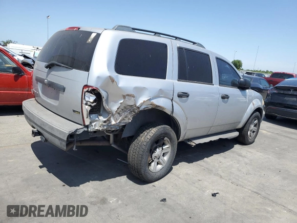 2007 Dodge Durango SXT with VIN 1D8HD38P07F556960, listed as a Copart auction lot 58940095 with 163,180 mi miles and Salvage title. Bid and sale history available at DreamBid. Image 3.