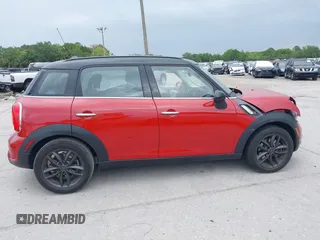 2013 MINI Countryman S z VIN WMWZC3C51DWP22150, wystawiony jako IAAI lot #41973886 z przebiegiem 28 947 mil mil oraz . Historia ofert i sprzedaży dostępna na DreamBid. Obrazek 13.