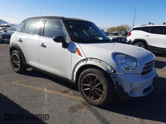 2015 MINI Countryman with VIN WMWZB3C53FWR45084, listed as a Copart auction lot 44647995 with 101,423 mi miles and Salvage Title. Bid and sale history available at DreamBid. Image 4.