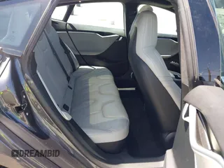 2016 Tesla Model S 90D with VIN 5YJSA1E22GF138236, listed as a IAAI auction lot 42532245 with 72,839 mi miles and . Bid and sale history available at DreamBid. Image 8.