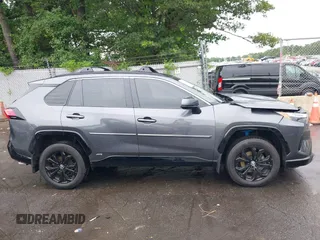 2022 Toyota RAV4 Hybrid SE with VIN JTM16RFV7ND067284, listed as a IAAI auction lot 42637821 with 20,512 mi miles and . Bid and sale history available at DreamBid. Image 13.