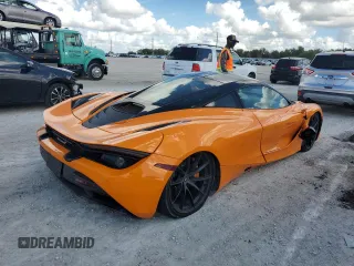 2019 McLaren 720S z VIN SBM14DCA9KW003247, wystawiony jako Copart lot #80073724 z przebiegiem 18 804 mil mil oraz Szkody całkowita. Historia ofert i sprzedaży dostępna na DreamBid. Obrazek 3.