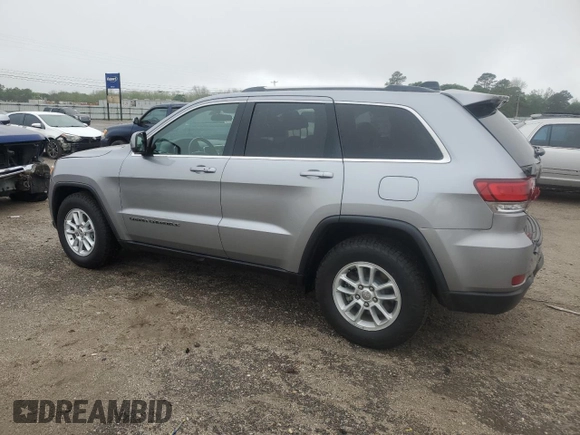 2020 Jeep Grand Cherokee Laredo E with VIN 1C4RJEAG0LC373572, listed as a Copart auction lot 52040195 with 86,604 mi miles and Salvage title. Bid and sale history available at DreamBid. Image 2.