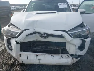 2019 Toyota 4Runner SR5 with VIN JTEBU5JRXK5700956, listed as a IAAI auction lot 41999972 with 61,032 mi miles and . Bid and sale history available at DreamBid. Image 6.
