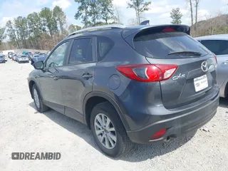 2015 Mazda CX-5 Touring with VIN JM3KE2CY2F0530204, listed as a IAAI auction lot 41788921 with 50,827 mi miles. Bid and sale history available at carsss.com. Image 3.