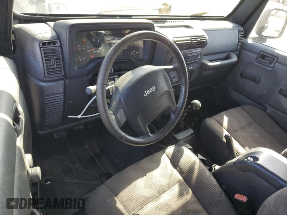 2005 Jeep Wrangler Rubicon with VIN 1J4FA69S05P351725, listed as a Copart auction lot 71411904 with 144,557 mi miles and Salvage Title. Bid and sale history available at carsss.com. Image 8.