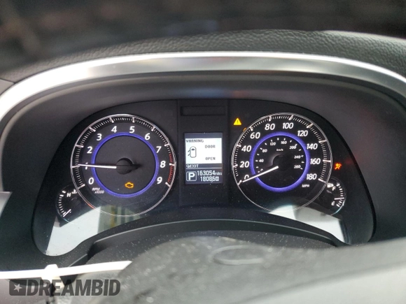 2016 Infiniti QX70 with VIN JN8CS1MU0GM671928, listed as a Copart auction lot 54887775 with 163,054 mi miles and Salvage title. Bid and sale history available at DreamBid. Image 9.