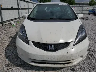 2013 Honda Fit с VIN JHMGE8H36DC045573, выставлен на аукционе Copart как лот 59525075 с пробегом 91 355 миль миль и Списание • Salvage title. История ставок и продаж доступна на DreamBid. Изображение 5.