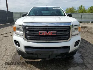 2015 GMC Canyon z VIN 1GTH6AEA7F1163952, wystawiony jako Copart lot #56680505 z przebiegiem 123 025 mil mil oraz Czysty tytuł • Clean title. Historia ofert i sprzedaży dostępna na DreamBid. Obrazek 5.