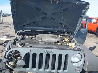 2015 Jeep Wrangler Unlimited Willys Wheeler with VIN 1C4BJWDG4FL589822, listed as a IAAI auction lot 41732614 with 149,112 mi miles and . Bid and sale history available at DreamBid. Image 10.